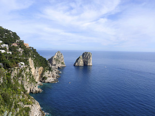 Capri is in the Bay of Naples. These are the limestone masses the Faraglioni Rocks that stand out...