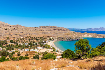 View of beach and Bay of Lindos on Rhodes island, Greece