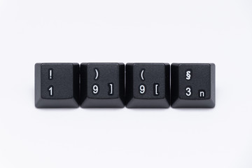 Black keys of keyboard with different years, words, names