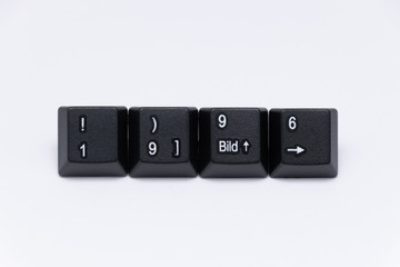 Black keys of keyboard with different years, words, names