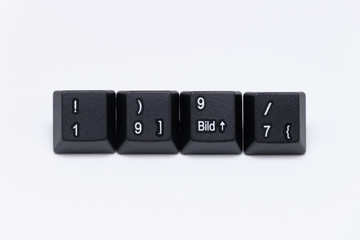 Black keys of keyboard with different years, words, names