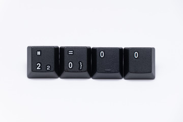 Black keys of keyboard with different years, words, names