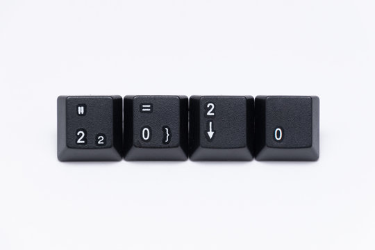 Black keys of keyboard with different years, words, names