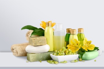 Obraz na płótnie Canvas Spa set: Aromatherapy bottles with scrub