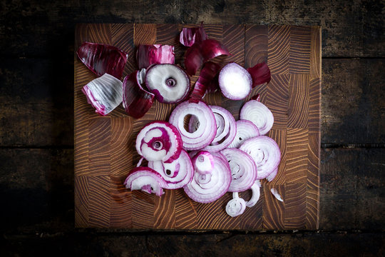 Sliced red onions for preparing healthy salad,selective focus