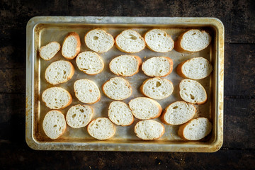 Sliced bread in the pan for preparing healthy salad,selective focus