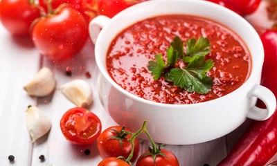 Fresh tomato soup in a white bowl