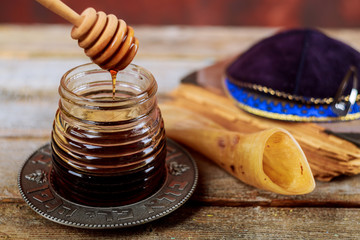 Pomegranate, apple and honey, traditional food of jewish New Year celebration, Rosh Hashana