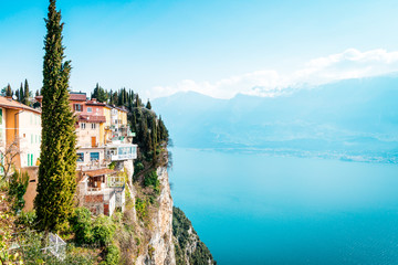 The cliffs of Tremosine sul Garda, view to the balconies at the cliffs next to the abyss, in the background Lake Garda, Italy