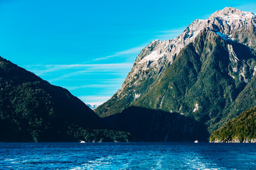 Snow capped mountains in Milford Sound, Fiordland, New Zealand