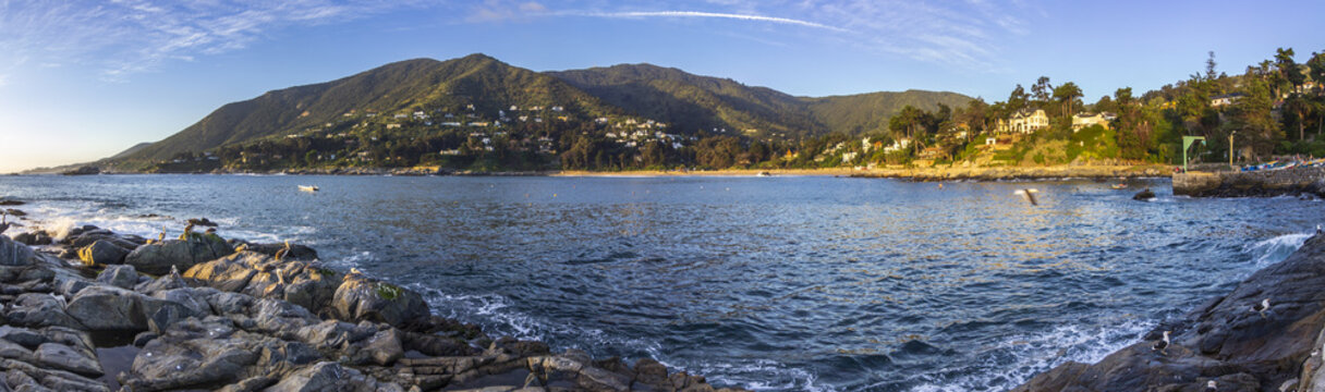 The sunset is coming and the last rays from the sun iluminate the horizon at "Zapallar", Chile, an amazing place and a popular balneary for enjoying the beach