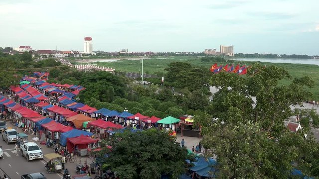 VIENTIANE,  LAOS - CIRCA AUGUST 2018 : Scenery of NIGHT MARKET and MEKONG RIVER.
