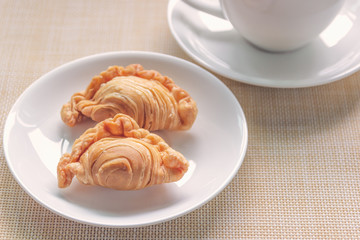 curry puff on white plate