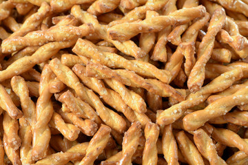 a pile of pretzel style cookie