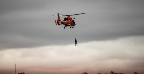 Fototapeta na wymiar Coast Guard Helicopter Rescue Mission