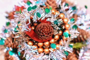 Beautiful artificial Christmas tree from the cones, Christmas decoration