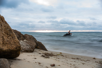Man Sitting on a Rock Long Exposure
