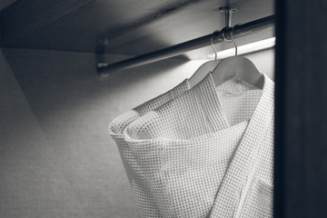 two bathrobe in hotel closet, monotone
