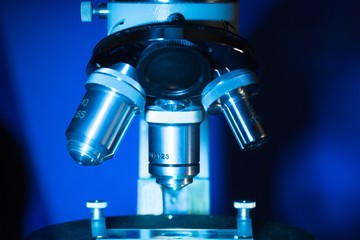 Fototapeta na wymiar Closeup of Microscope Lenses and Slide