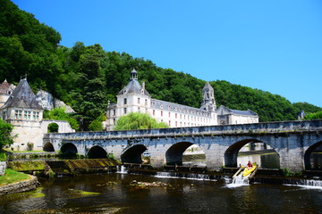 Obraz premium The Benedictine Abbey of Brantome on the Dronne River in Nouvelle Aquitaine, France