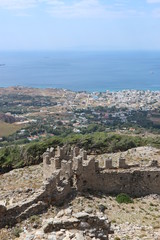 Fototapeta na wymiar View to Karystos and Mediterranean sea from byzantine castle Castello Rosso, island of Evia, Greece