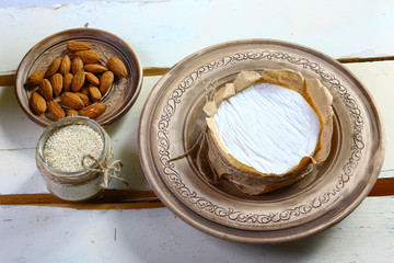 Round white cheese tasting on wooden background . top view image with copy space, set