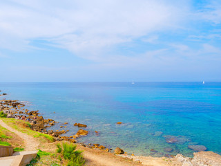 View of the sea and a part of the coast in Alghero. Sardinia, Italy.