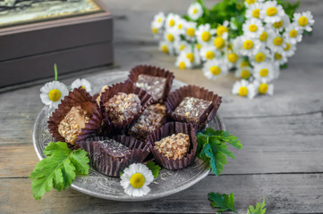 Handmade chocolates on the table. Selective focus
