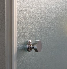 Brilliant, polished door handle for glass shower cubicle