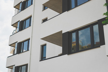balconies of a building, a building in a residential area.