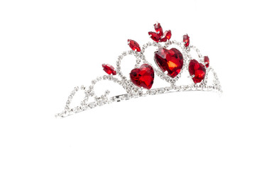 silver diadem with hearts, rubies and diamonds isolated on white