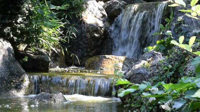 Waterfall cascade in park video HD