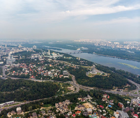 Fototapeta premium Aerial view Panorama of Kiev city above the National Botanical Garden named after M.M. Grishka.
