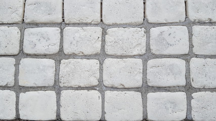 Grey white brick wall texture background rectangular pavers