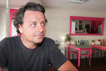 handsome man sit on coffee restaurant looking side