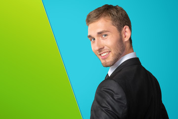 Young Businessman looking over his shoulder