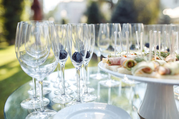 Champagne glasses on gold background. Party and holiday celebration concept.