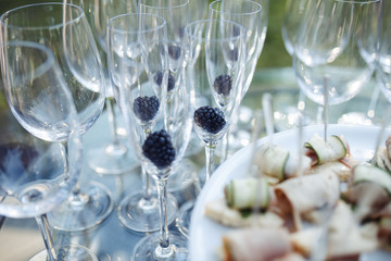 Champagne glasses on gold background. Party and holiday celebration concept.