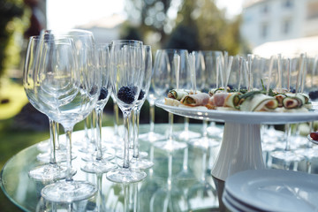 Champagne glasses on gold background. Party and holiday celebration concept.