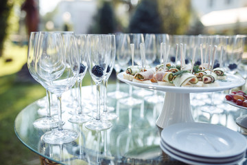 Champagne glasses on gold background. Party and holiday celebration concept.