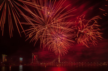 Magnificent fireworks over the River Daugava. Riga, Latvia. Long exposure. Copy space.