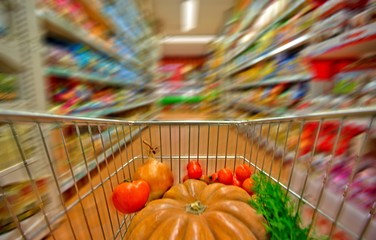 Inside View of Shopping Cart Full of Groceries with Motion Blur