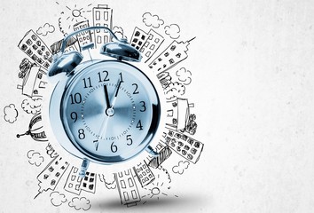 Yellow alarm clock on background