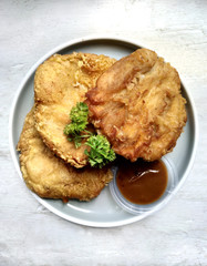 Fried Banana on White Plate With Srikaya Coconut Eggs Jam and Celery. Indonesia Traditional Snack Known As Pisang Goreng