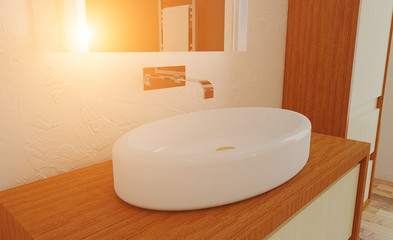 Washbasin on a wooden cupboard in the bathroom. Sunset