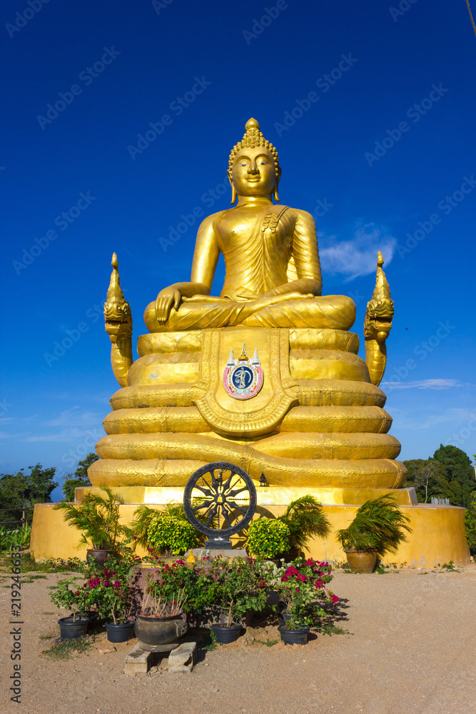 Wall mural 12 meters high Big Buddha Image, made of 22 tons of brass in Phuket