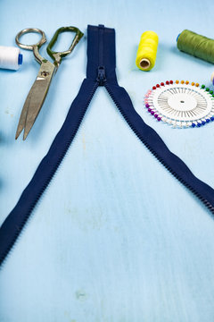 Unbuttoned zipper and sewing accessories