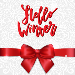 Fototapeta na wymiar Christmas Greeting Card with Red Satin Bow and Ribbon with Lettering Calligraphy Hello Winter. Template for Congratulations, Housewarming posters, Invitations, Photo overlays. Vector