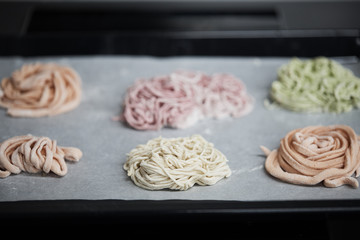 colored noodles green pink orange