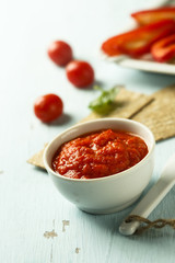 Roasted pepper dip with crisps and vegetables